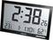Digital ur med stor display, viser 2:38, temperatur 23,5°C, dato 1-1 MAN og luftfugtighed 62%.
