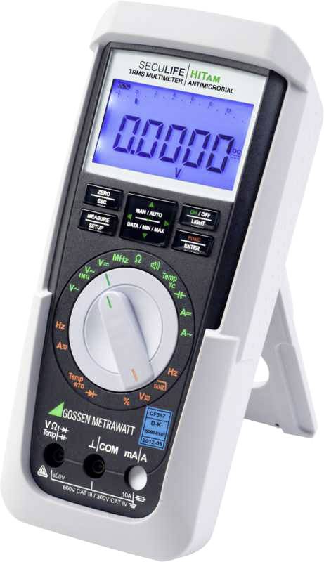 Et bærbart digitalt multimeter viser en måling på '0.0000 V' på en blå skærm. Mærkenavnet er synligt øverst.