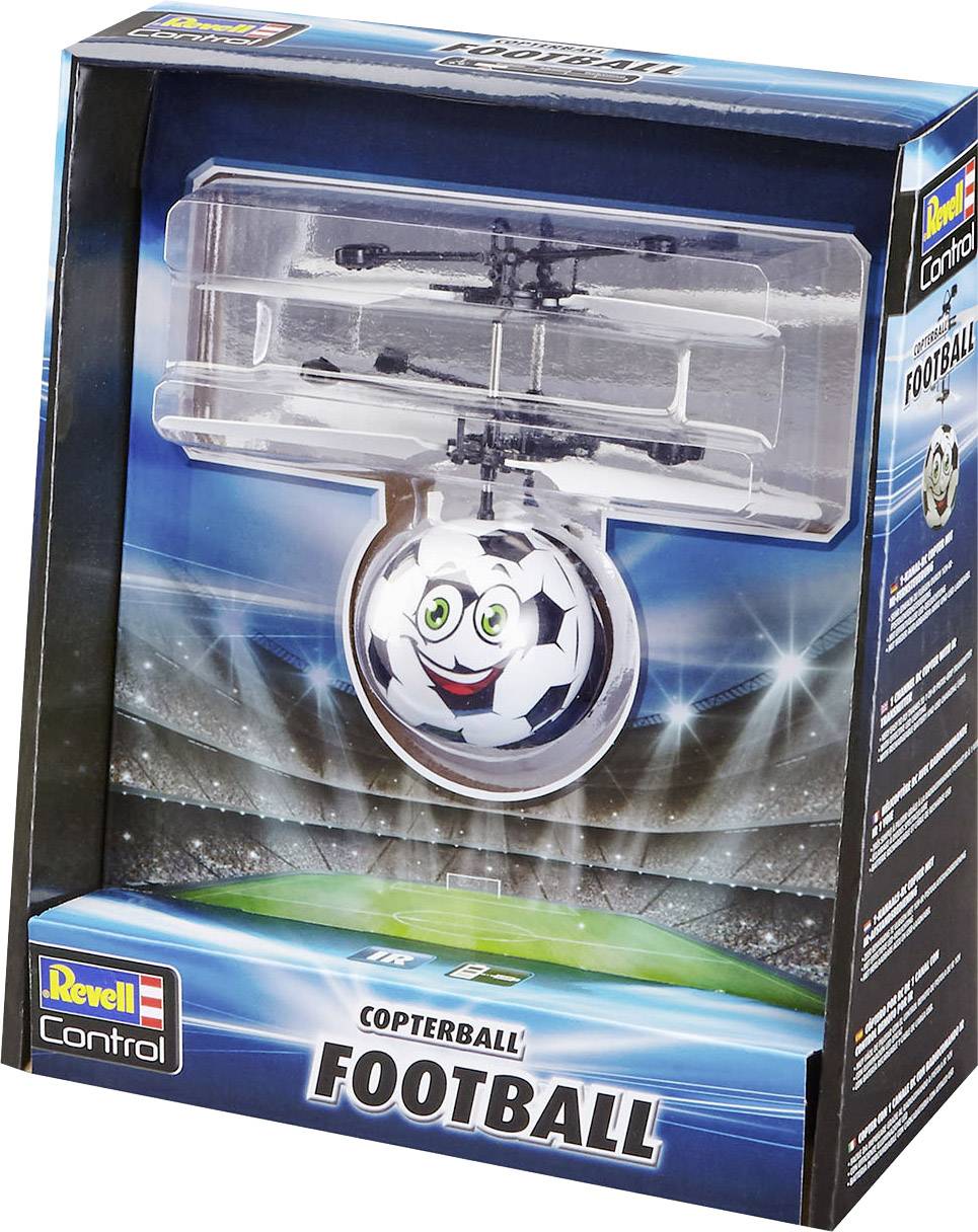 Legetøjsdrone i form af en fodbold-helikopter i en farverig emballage, egnet for børn, på en stadionbaggrund.