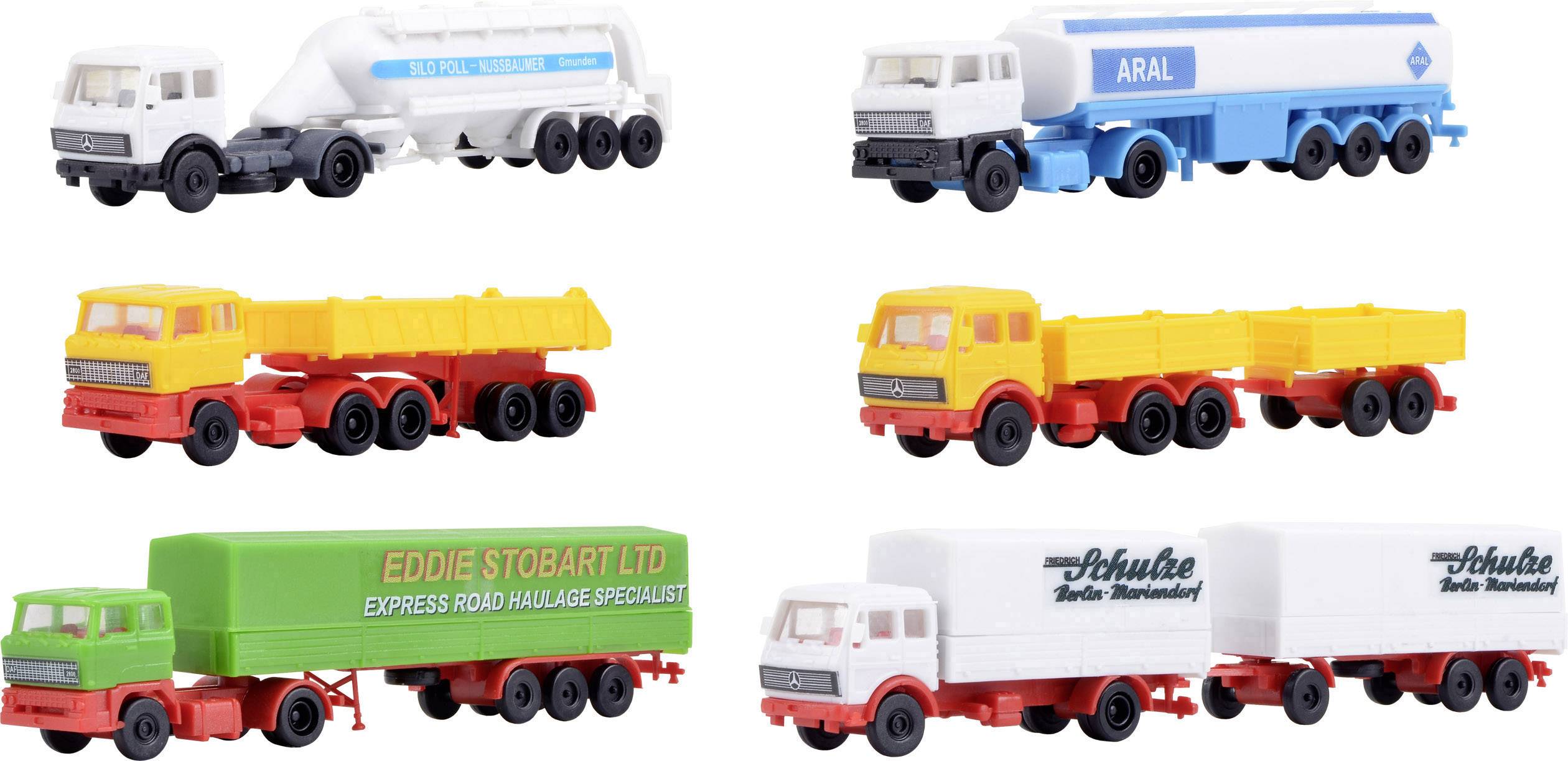 Seks farverige legetøjslastbilmodeller: foran og bag tankbiler med 'ARAL'-logo øverst, andre med påhængsvogne, én med påskriften 'EDDIE STOBART LTD'.