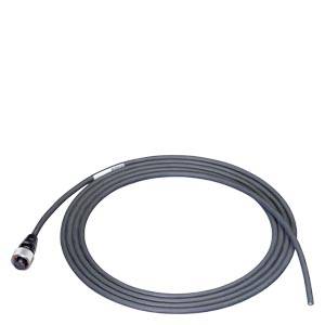 Grå koaksialkabel, oprullet med et stik i den ene ende, velegnet til audiovisuelle forbindelser.