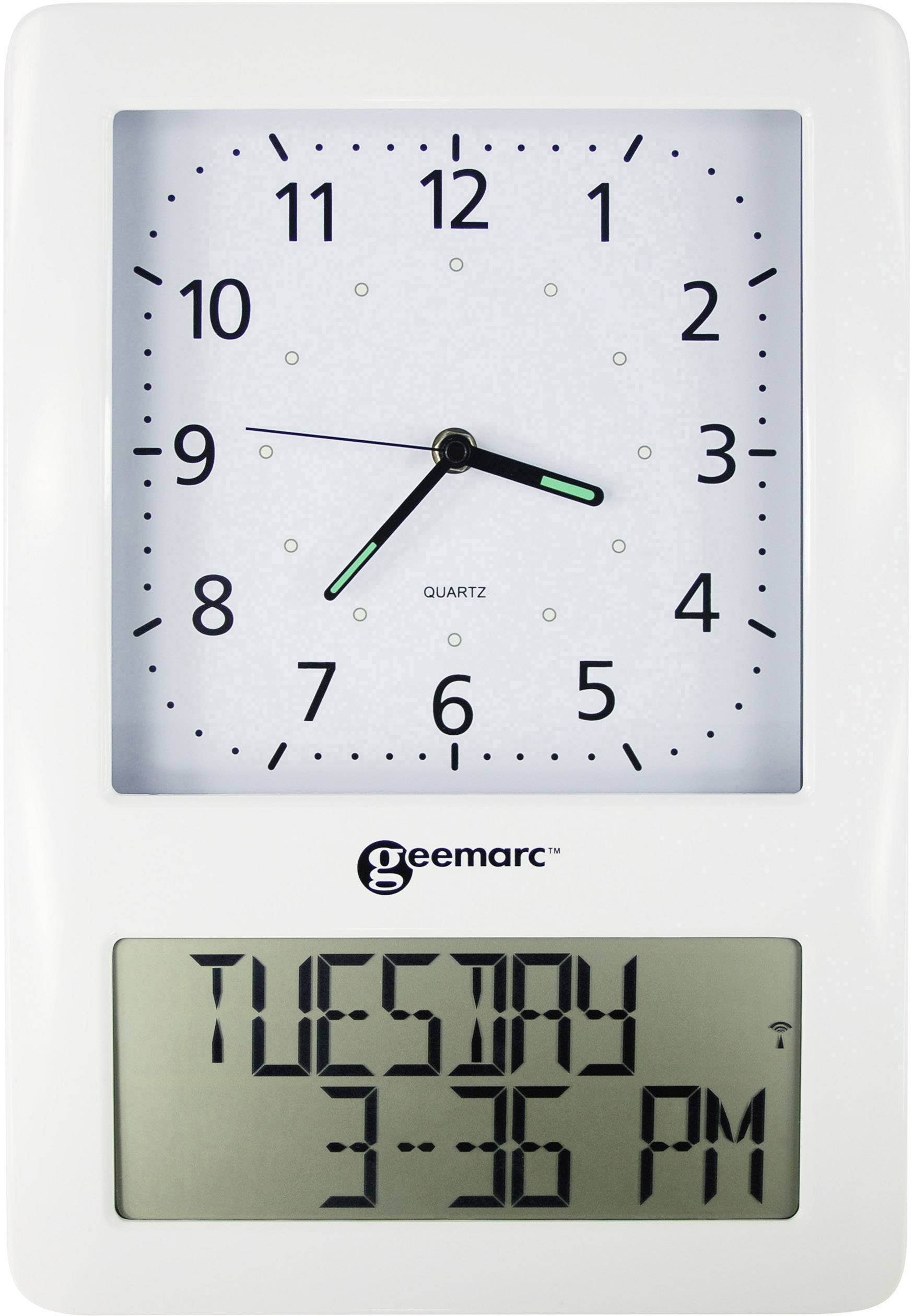 Analog vægur med hvidt urskive og sorte visere. Nedenunder digitalt display med 'TIRSDAG, 21:36'.