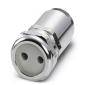 Metaladapter i cylinderform med to runde huller på forsiden.