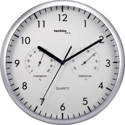 Et analogt vægur med sølvramme viser 10:09. Mindre urskiver viser hygrometer (% luftfugtighed) og temperatur (°C).