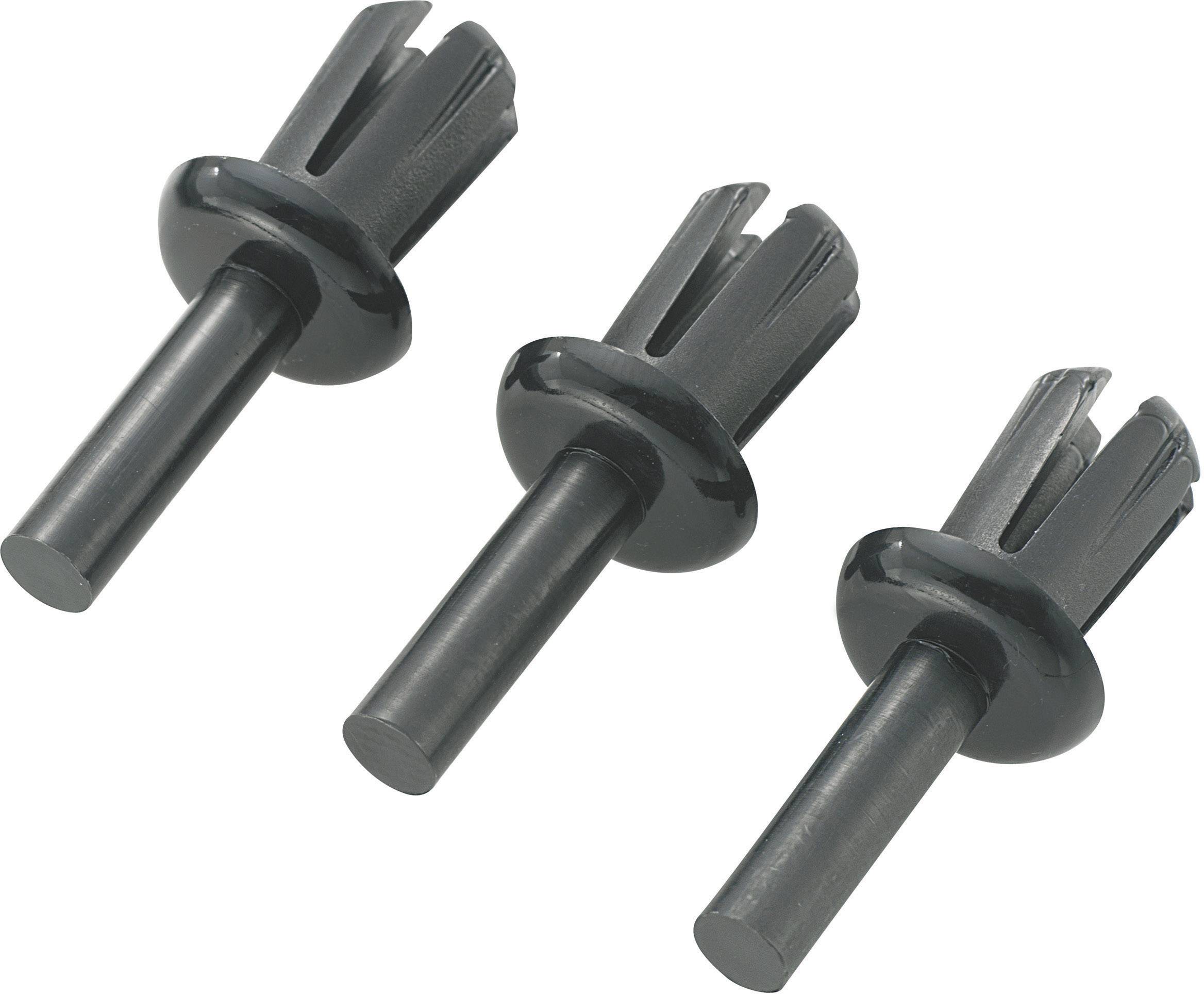 Tre sorte plastik-rawlplugs i en diagonal placering, hver med et rundt hoved og en spids ende.