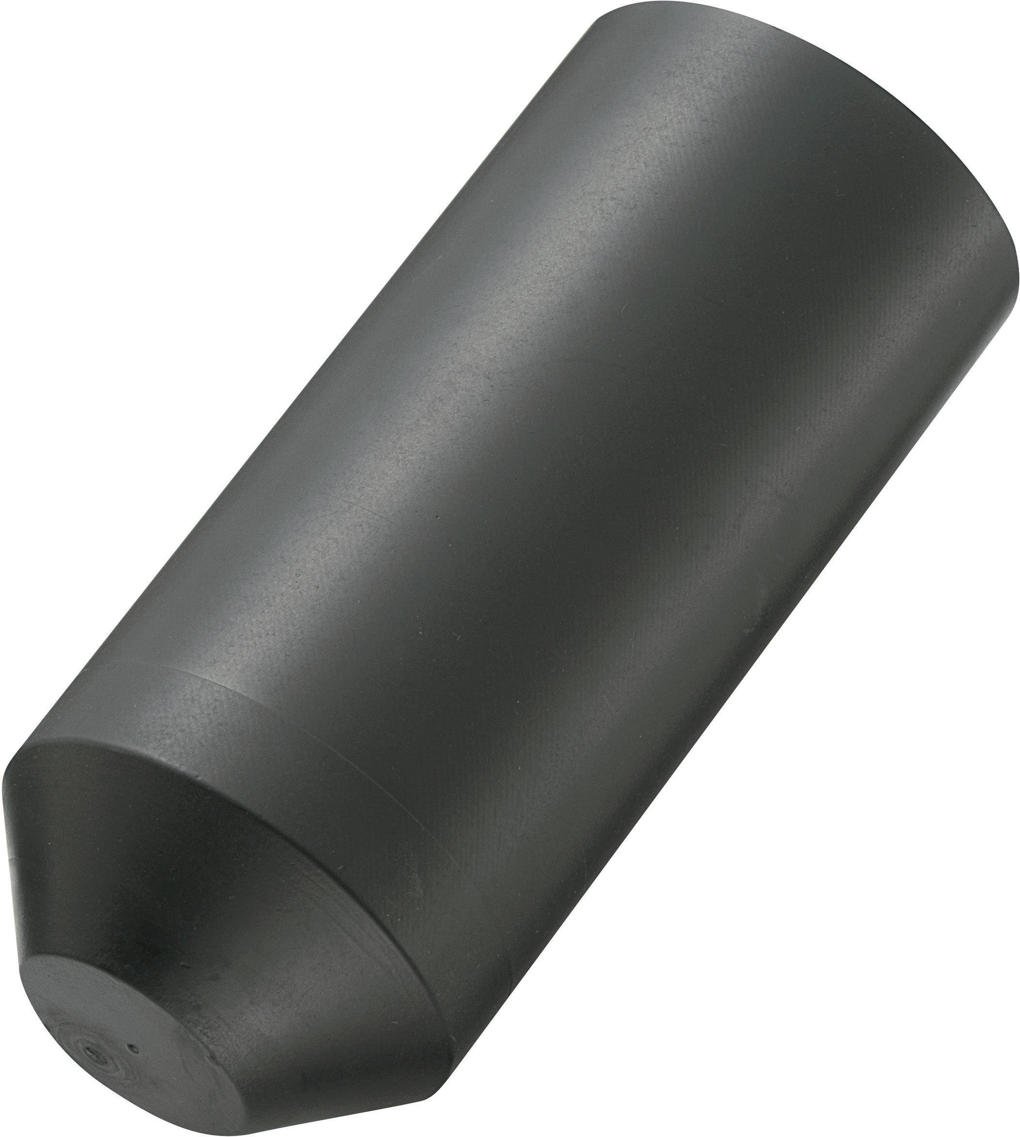 Et cylinderformet, sort objekt med en flad spids er afbildet. Materialet ser metallisk ud.