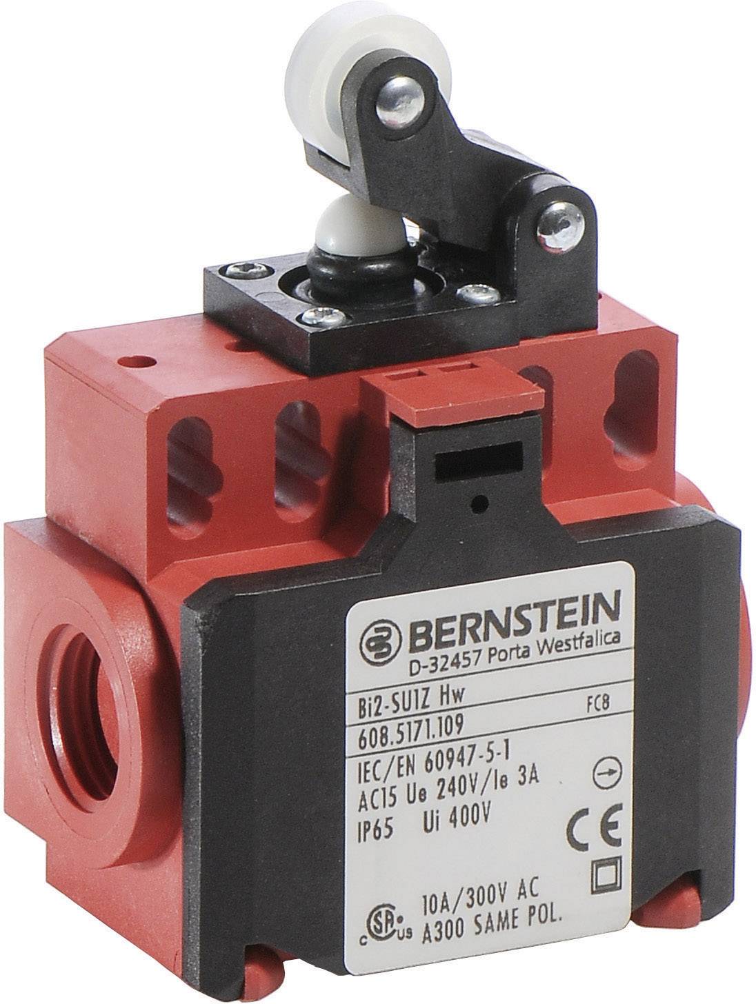 En rød-sort kontakt fra mærket Bernstein med følgende tekniske specifikationer: AC 15, Ui 400V, IP65, 10A/300V AC, IEC/EN-standarder.