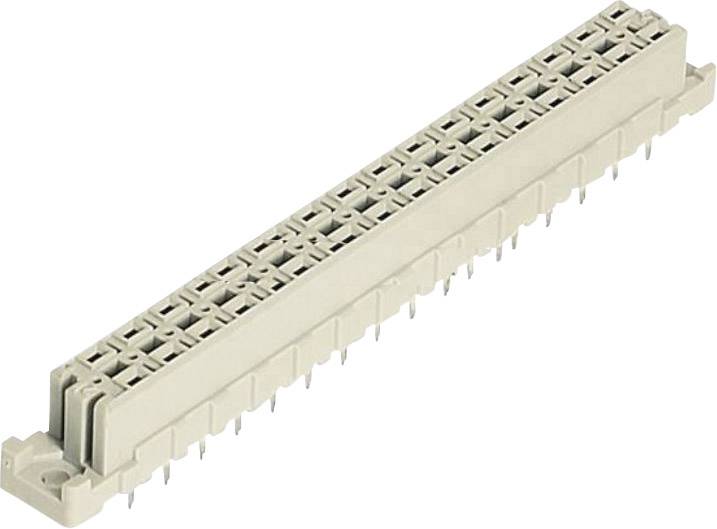 Der ses et rektangulær, beige elektrisk stik med flere tilslutninger, som bruges til forbindelse af elektroniske komponenter.
