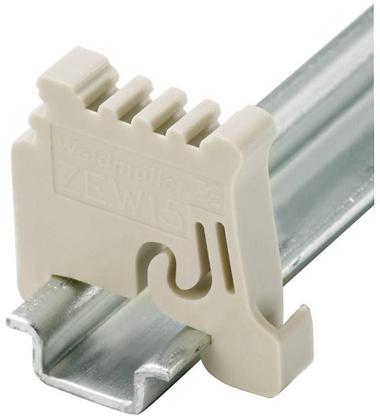 Plastikbeslag fra Weidmüller, beige, til DIN-skinne. Indeholder virksomhedens logo og produktbetegnelse 'ZEW15'.