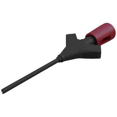 Ein schwarzes Kabel mit einer roten Kunststoffisolierung zeigt eine elektronische oder elektrische Verbindungsvorrichtung.