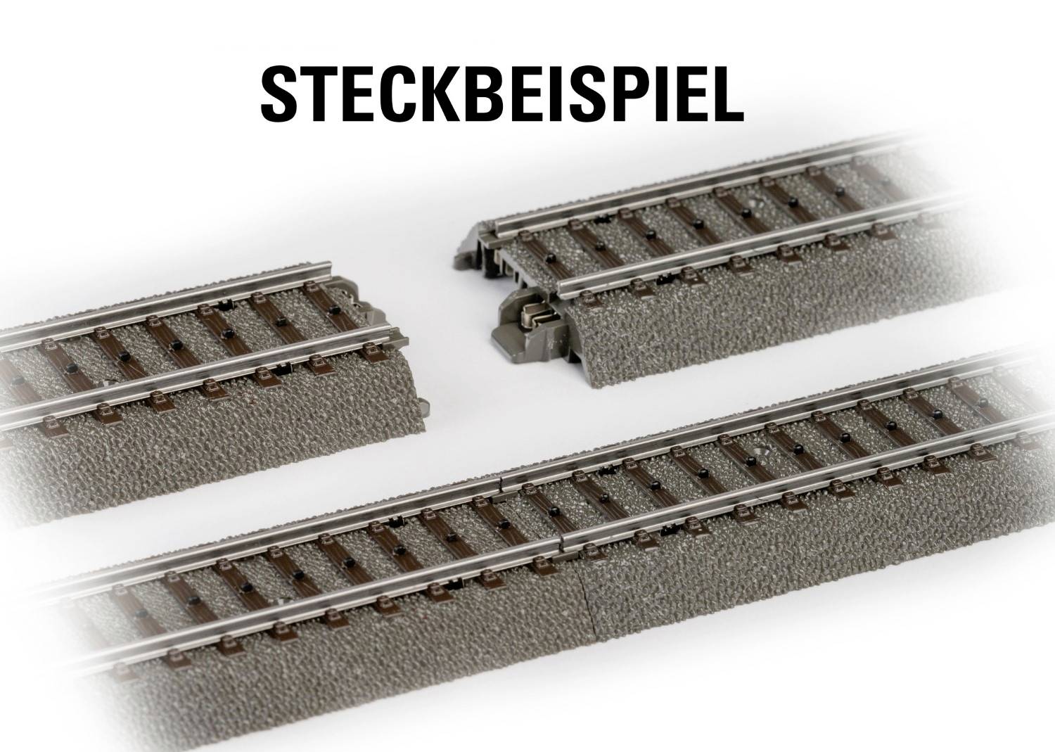 Bahnstrecken-Modell zeigt Verbindung zweier Gleisstücke. Oben steht der Text 'STECKBEISPIEL'.