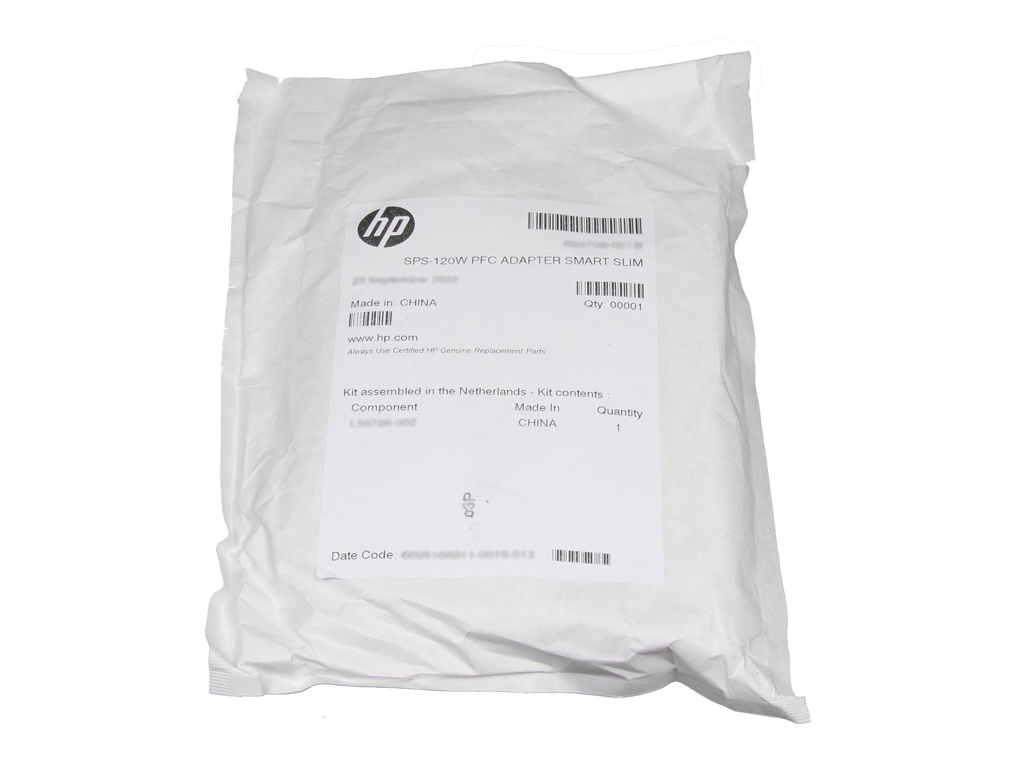 Eine Verpackung mit der Aufschrift 'HP SPS: 120W PFC Adapter Smart SLIM', hergestellt in China, zeigt ein Ersatzteil-Set.
