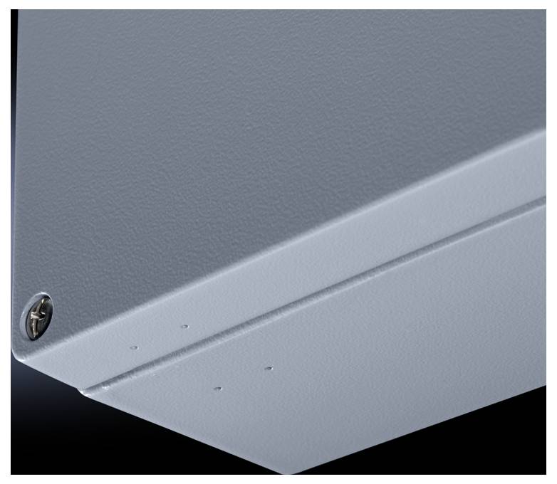 Nahaufnahme eines grauen Metallelements mit abgerundeten Kanten und einem sichtbaren Schraubenkopf auf der linken Seite.