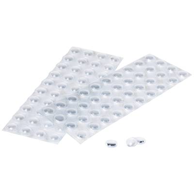 Zwei geöffnete Blisterpackungen mit Tabletten und zwei lose Tabletten auf einem weißen Hintergrund.