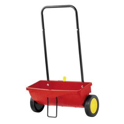 Ein roter Streuwagen mit schwarzem Griff und gelben Rädern, geeignet zur Verteilung von Samen oder Dünger auf Rasenflächen.
