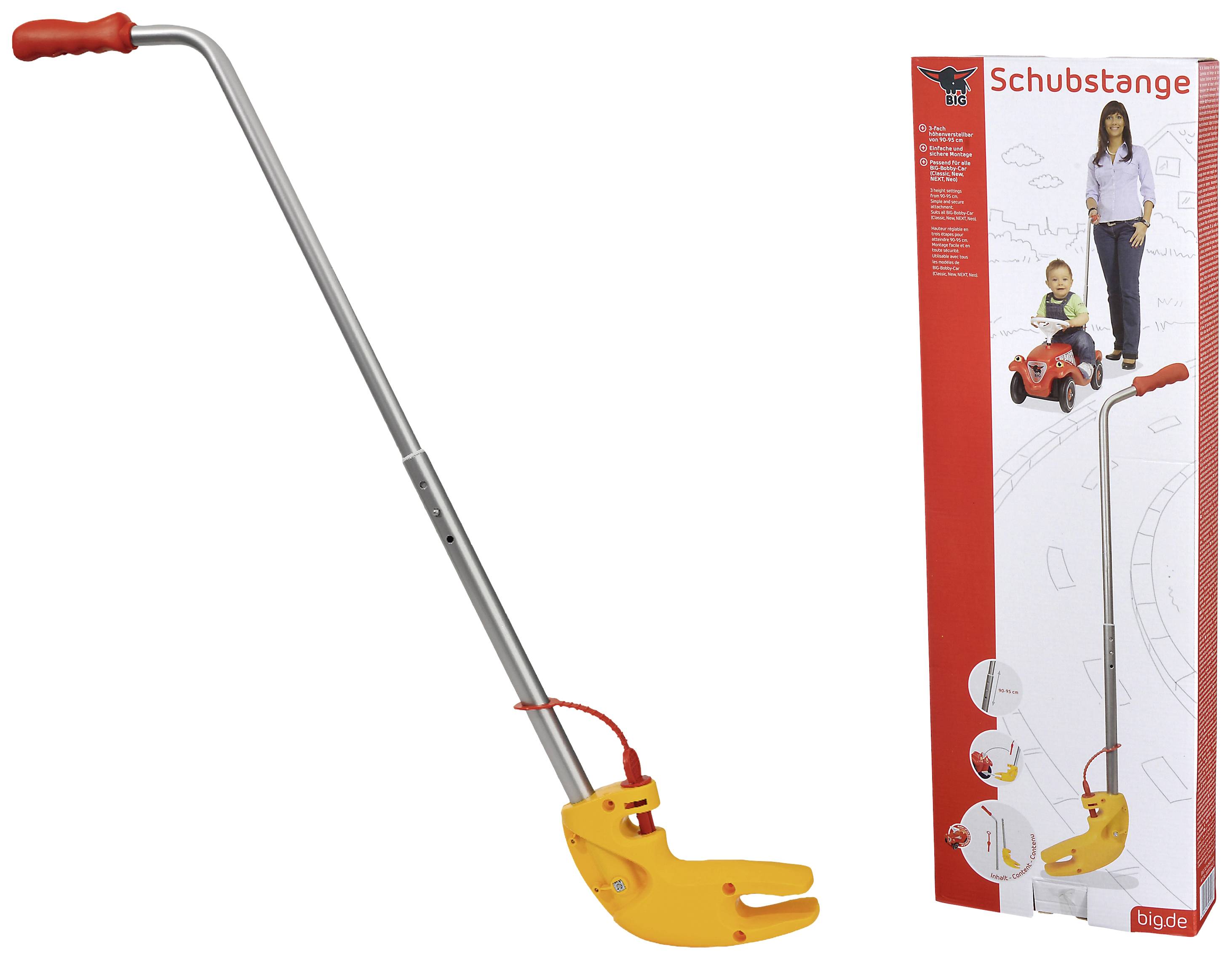 Schubstange mit rotem Griff und gelber Halterung für Kinderfahrzeuge. Verpackungsbild zeigt Frau, die Kind in Auto schiebt.