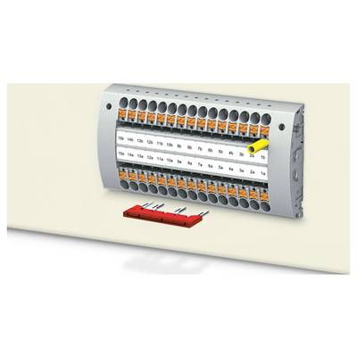 Ein Klemmleistenblock mit gekennzeichneten orange- und graufarbigen Anschlüssen, der nummerierte Reihen und Spalten zeigt, zusammen mit einem roten Zubehörwerkzeug.