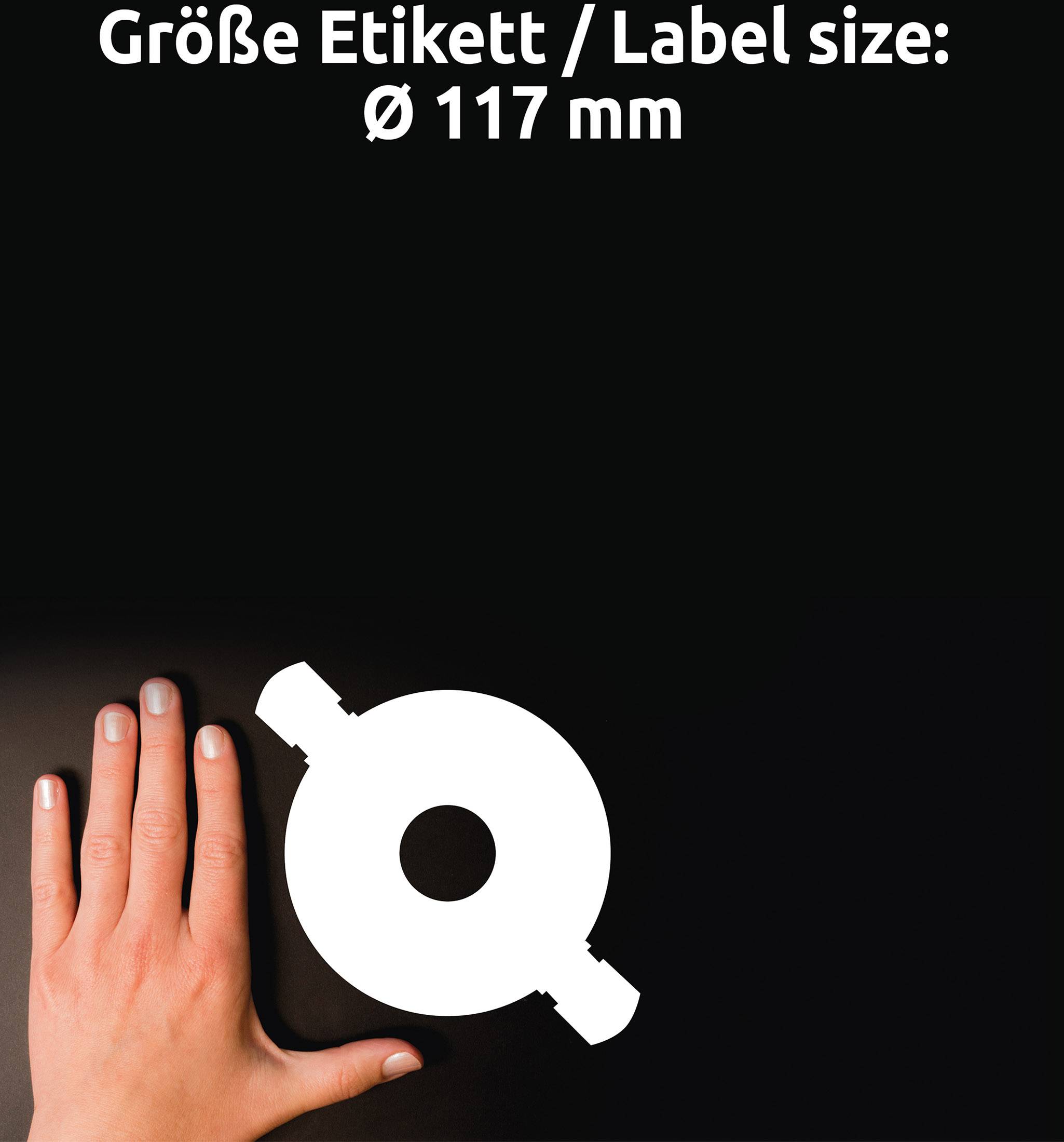 Eine Hand zeigt auf einen weißen, kreisförmigen Etikett-Schablone mit einem Durchmesser von 117 mm; Text darüber 'Größe Etikett'.