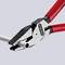 Eine rote Zange schneidet ein elektrisches Kabel. Die Zange zeigt das Markenzeichen 'Knipex'.