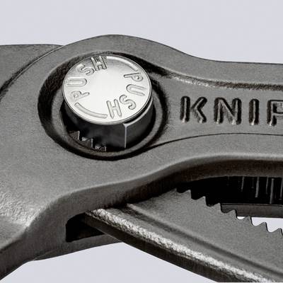 Eine Metallzange mit der Aufschrift 'KNIPEX' und einer Druckknopfvorrichtung zum einfachen Verstellen der Greifweite.