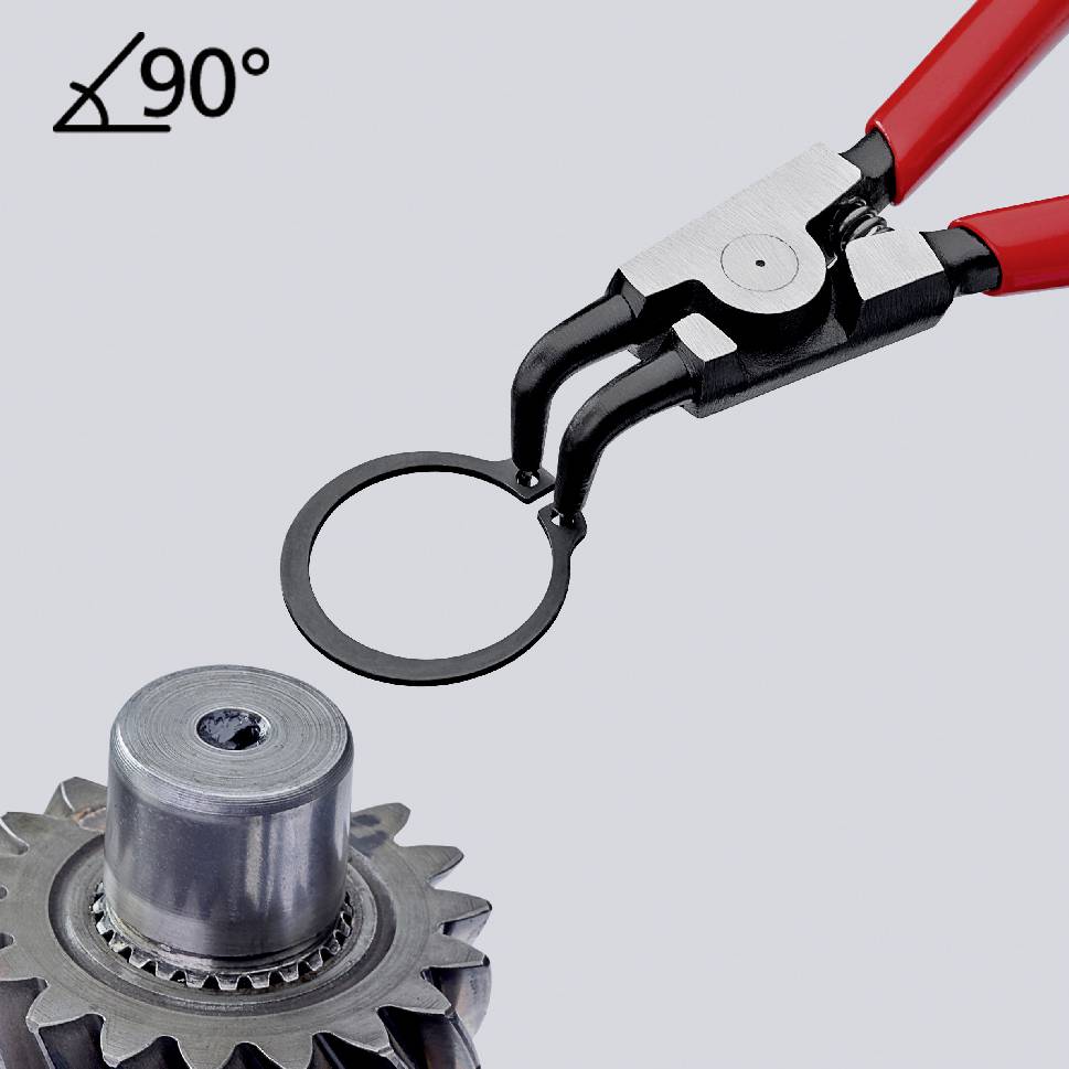 Eine Zange mit roten Griffen entfernt einen Sicherungsring von einem metallischen Bauteil. Ein Winkel von 90 Grad ist markiert.