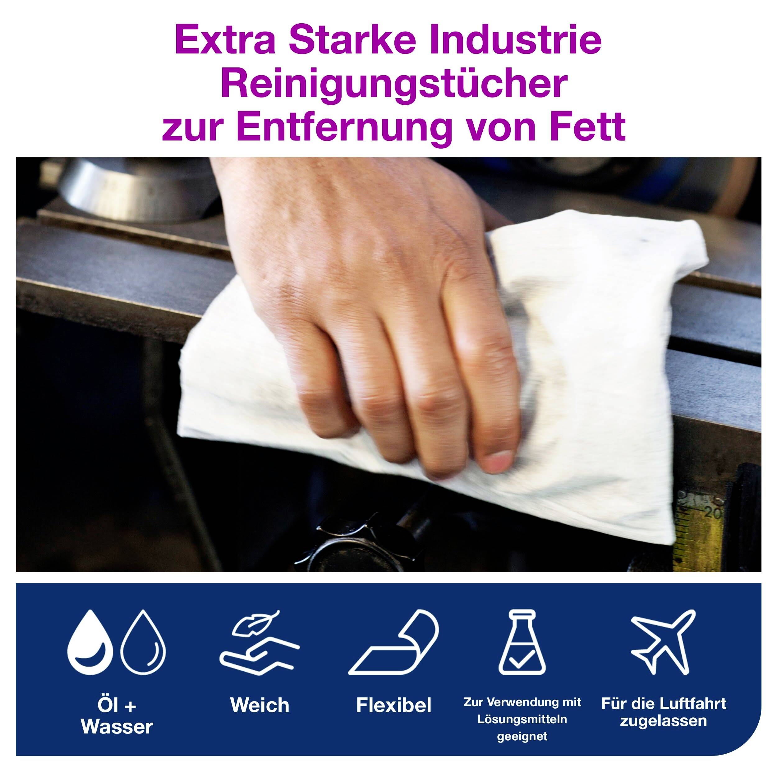 'Hand wischt mit weißem Tuch über ölige Oberfläche. Text oben: Extra Starke Industrie Reinigungstücher zur Entfernung von Fett.'