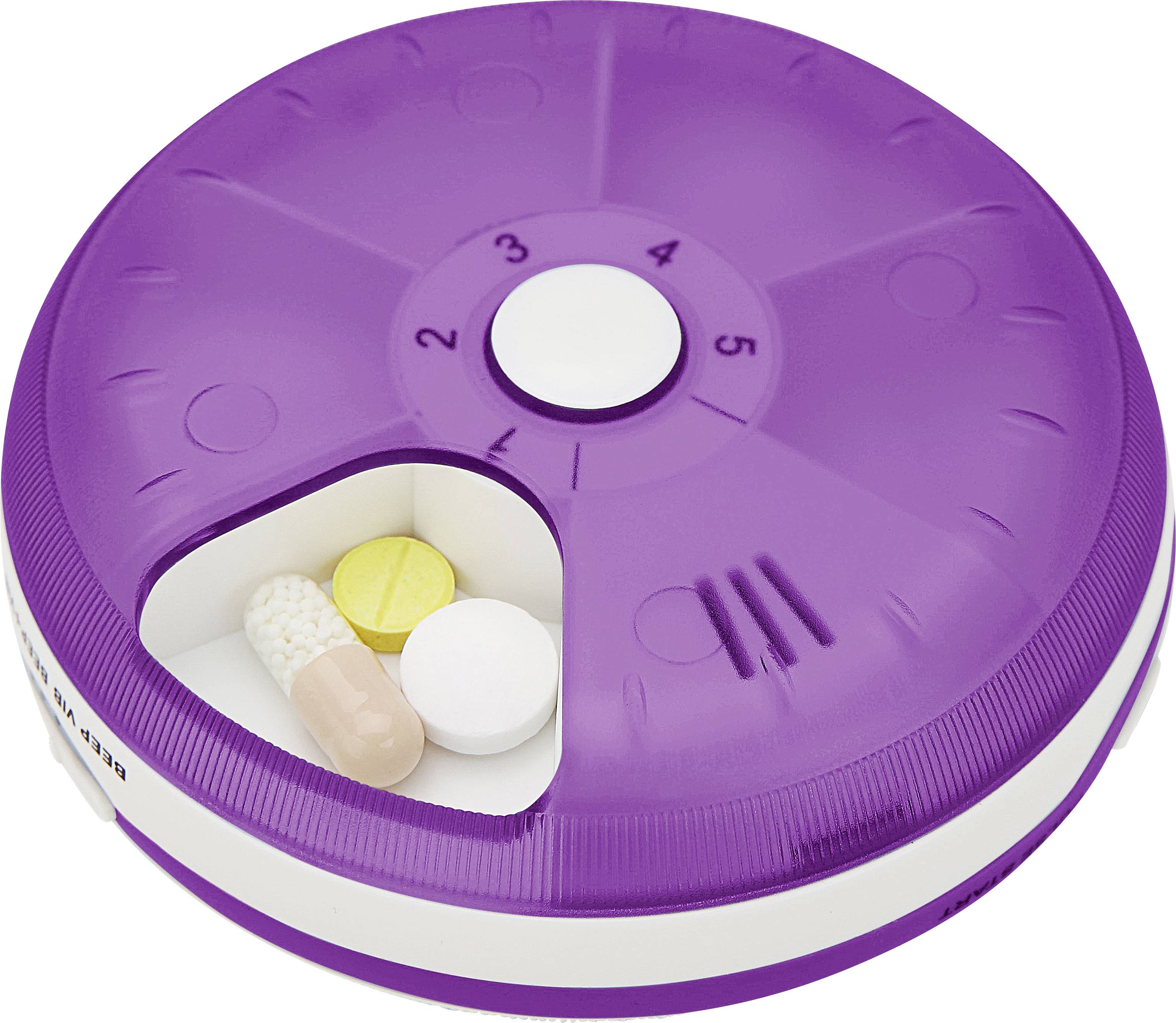 Violetter Tablettenspender mit fünf Fächern, eines geöffnet und gefüllt mit drei verschiedenen Tabletten.