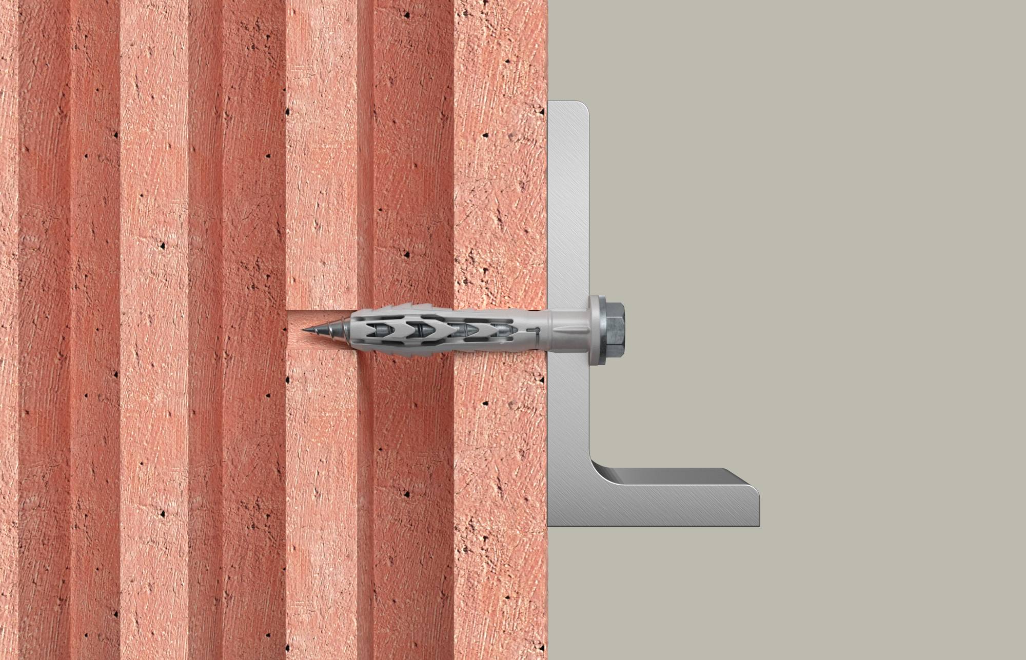 Metallwandanker, teilweise in eine vertikale orangefarbene Mauerwerkswand eingebaut, mit einer silbernen Montageklammer auf der rechten Seite befestigt.