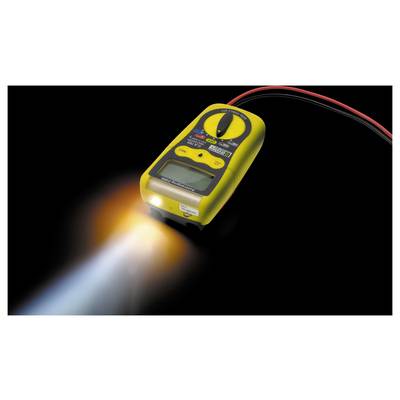 Ein gelbes Multimeter mit hintergrundbeleuchtetem Display, eingeschaltet auf einem dunklen Hintergrund. Zeigt eine helle LED-Leuchte.