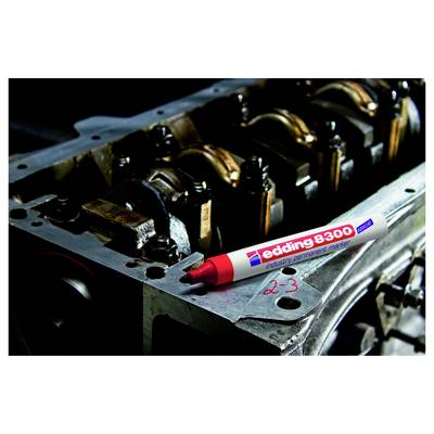 Roter Edding 8300 Industrie-Permanentmarker, der auf einem Metallteil eines Motors ruht, mit roter handschriftlicher Beschriftung "2-3" auf der Oberfläche.