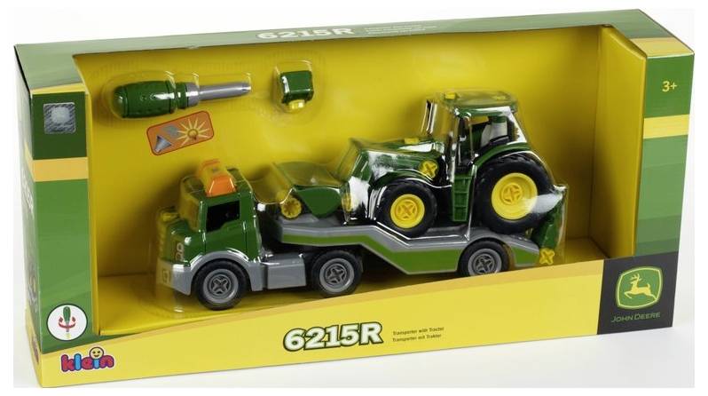 Spielzeug-Set-Box mit einem Spielzeug-Traktor und Anhänger, inklusive Schraubendreher, in grüner und gelber Verpackung der Marke 'John Deere', geeignet für Kinder ab 3 Jahren.