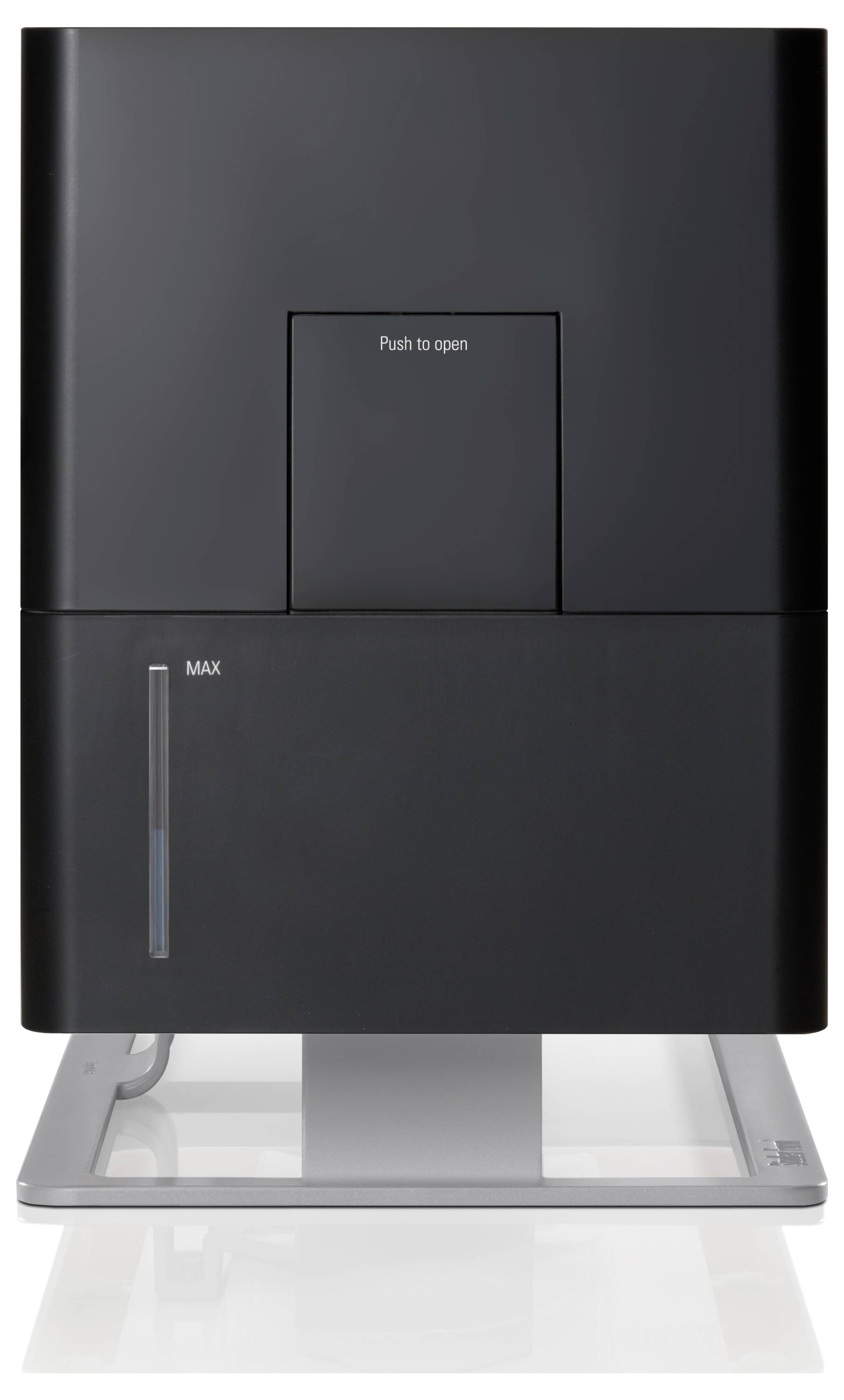 Frontansicht eines schwarzen Computermonitor-Sockels mit einem zentrierten "Push to open"-Bedienfeld und einem sichtbaren Wasserstandsindikator mit der Markierung "MAX" auf der linken Seite.