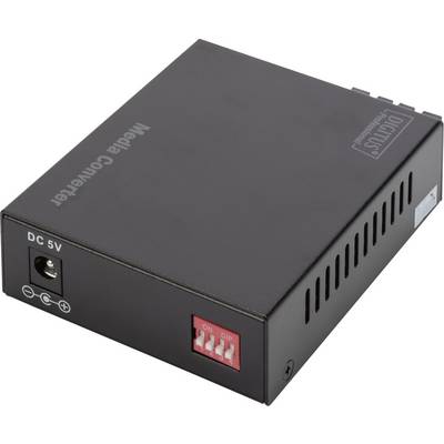 Schwarzer Media Converter, zeigt Netzteilanschluss und Schalter. Dient zur Umwandlung von Netzwerkmedien, typischer Büroausstattung.