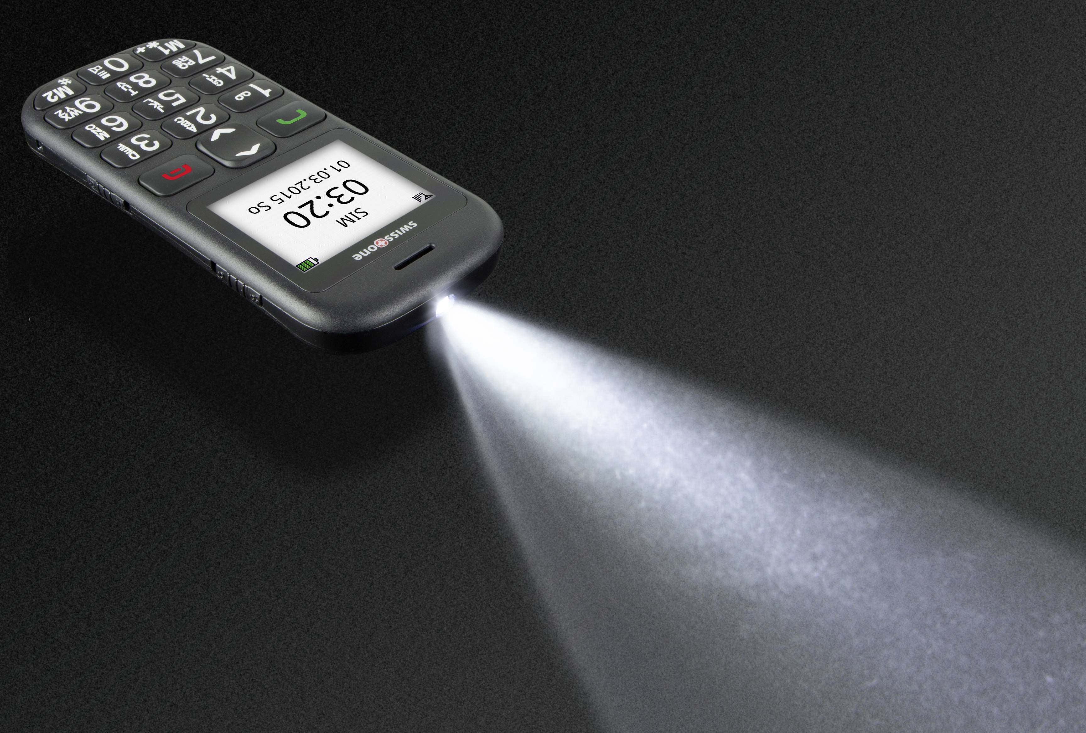 Ein Mobiltelefon mit großen Tasten und einem leuchtenden Blitzlicht, das als Taschenlampe dient.