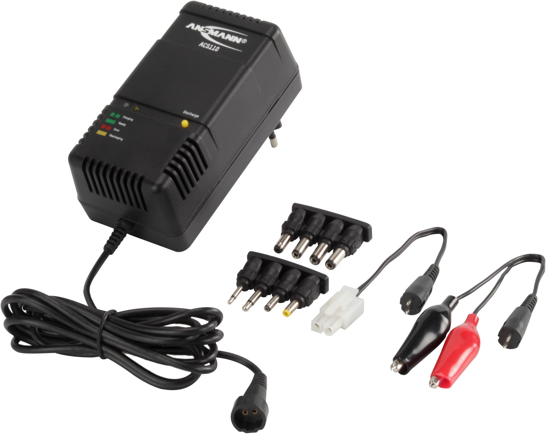 Das Bild zeigt ein einfaches Steckerladegerät inkl. diverser Steckeradapter der Firma Ansmann.