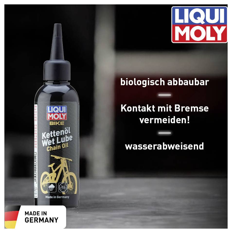 Eine Flasche LIQUI MOLY Kettenöl auf einem Tisch, mit Text 'biologisch abbaubar', 'Kontakt mit Bremse vermeiden!' und 'wasserabweisend'. Made in Germany.