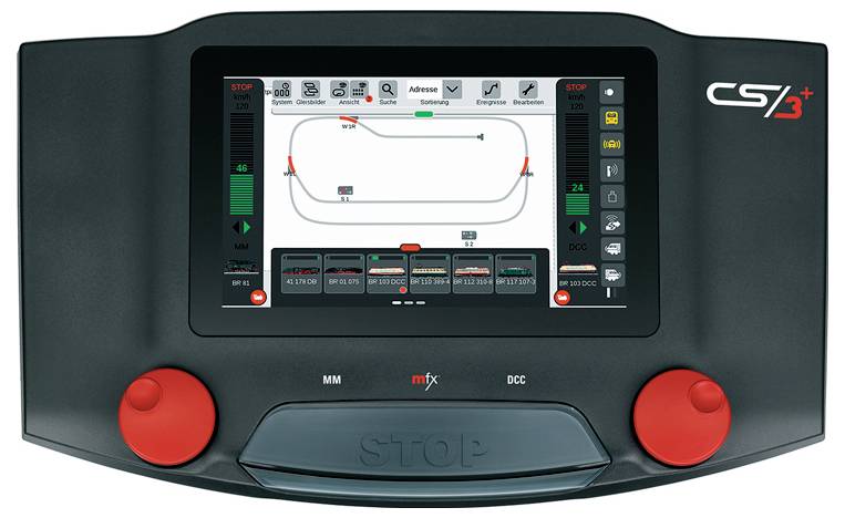 Ein elektronisches Kontrollpanel mit Bildschirm zeigt ein Diagramm mit Schaltkreisen und Bedienknöpfen. Zwei rote Knöpfe sind sichtbar.