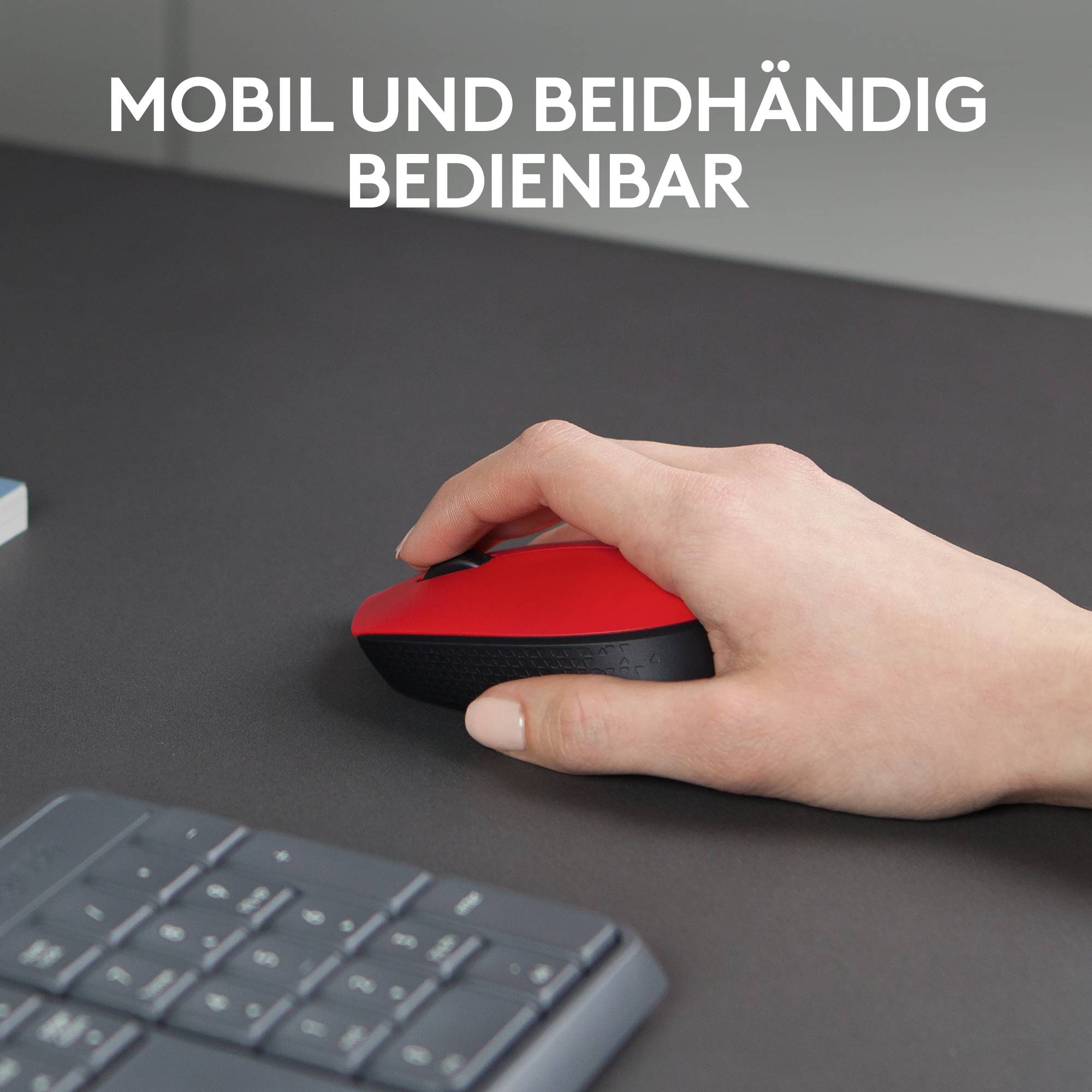 Eine Hand bedient eine rote Maus neben einer Tastatur. Darüber steht: 'Mobil und beidhändig bedienbar'.