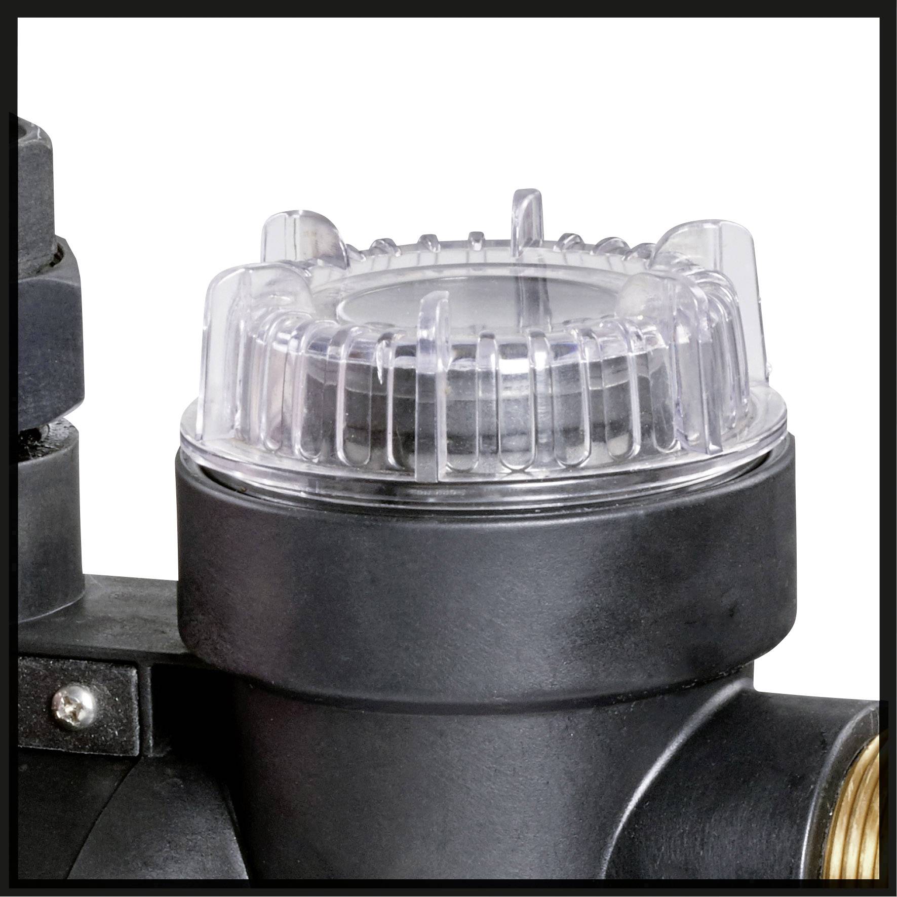 Eine Nahaufnahme eines transparenten, runden Gehäusedeckels eines Wasserfilters auf einem schwarzen Gerät.