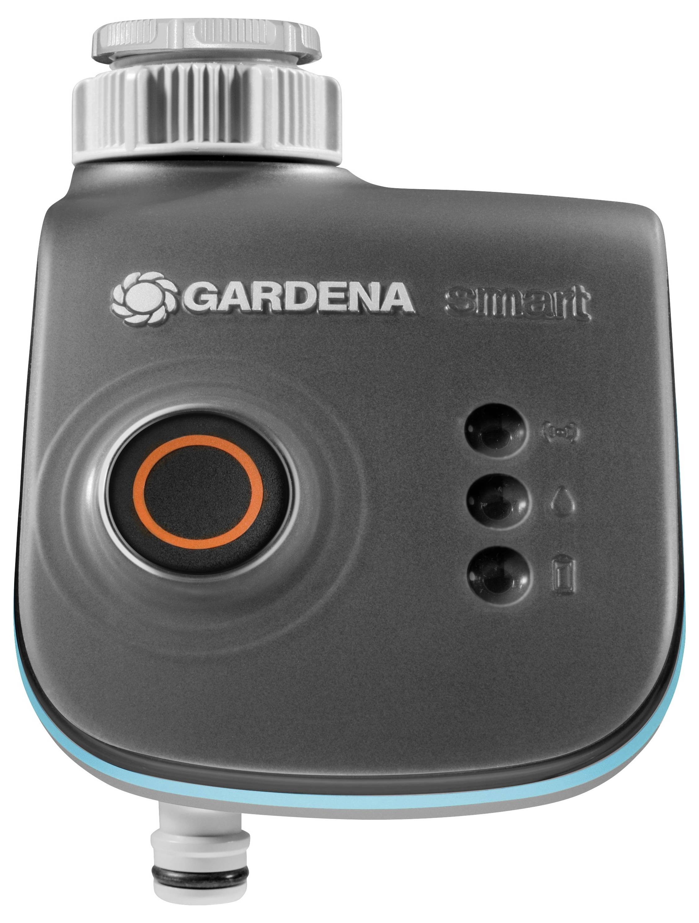 'GARDENA smart' Wassersteuergerät, grau, mit Knöpfen und orangefarbenem Ring, wird zur automatisierten Bewässerungssteuerung verwendet.