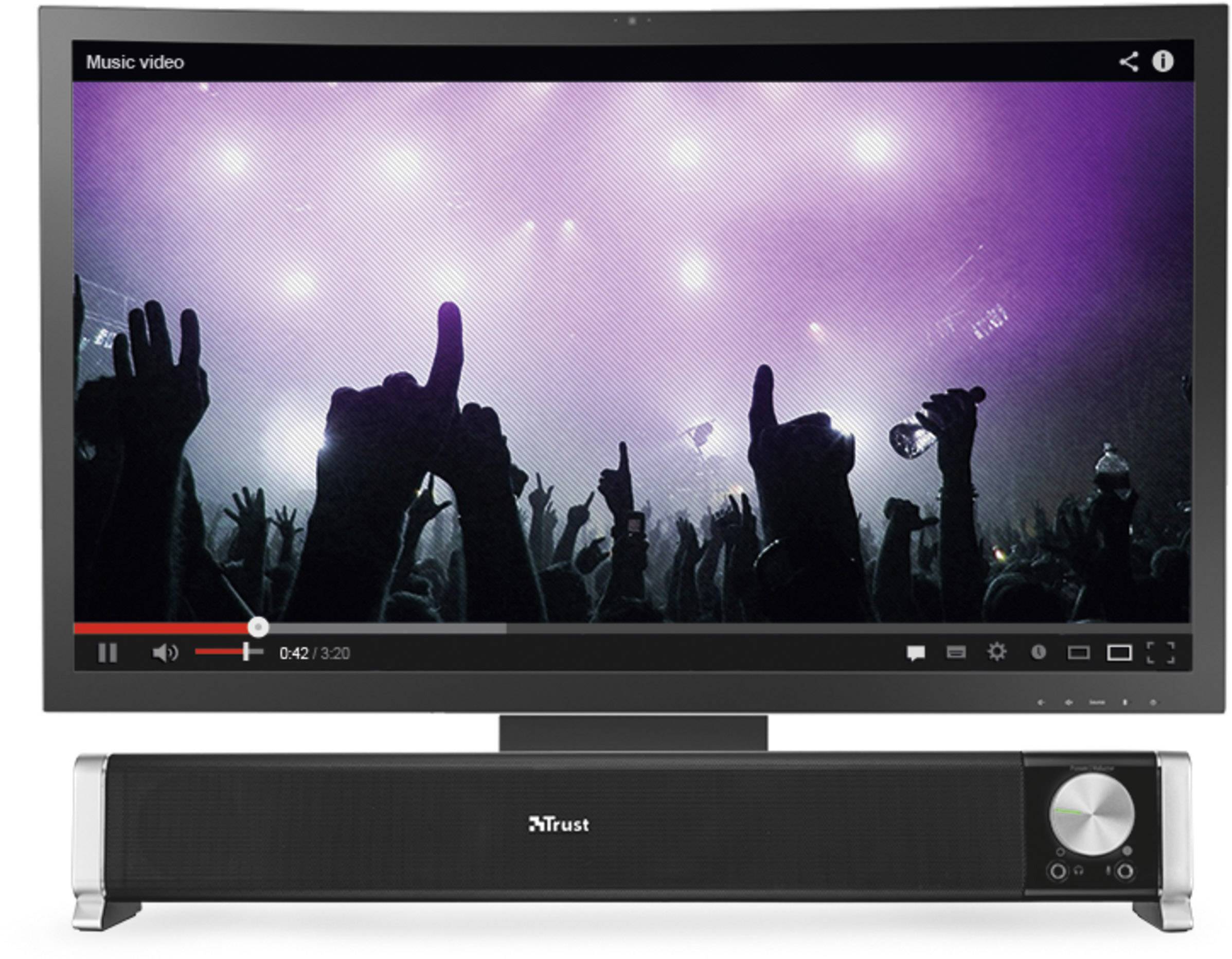 Ein großer Monitor zeigt ein Musikvideo mit einer Menschenmenge bei einem Konzert. Darunter steht eine Lautsprecherleiste von Trust.