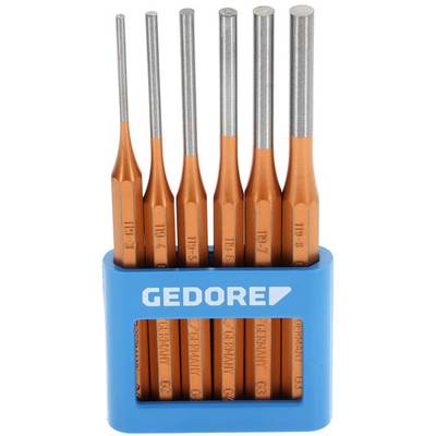 Sechsteiliges Meißelset in orangeem Design in einem blauen Halter. Werkzeugmarke 'GEDORE' ist auf dem Halter sichtbar.