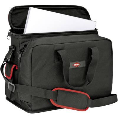 Eine schwarze Werkzeugtasche mit Tragegurt und Knipex-Logo. Ein silbernes Laptop-ähnliches Objekt ragt aus dem Hauptfach heraus.