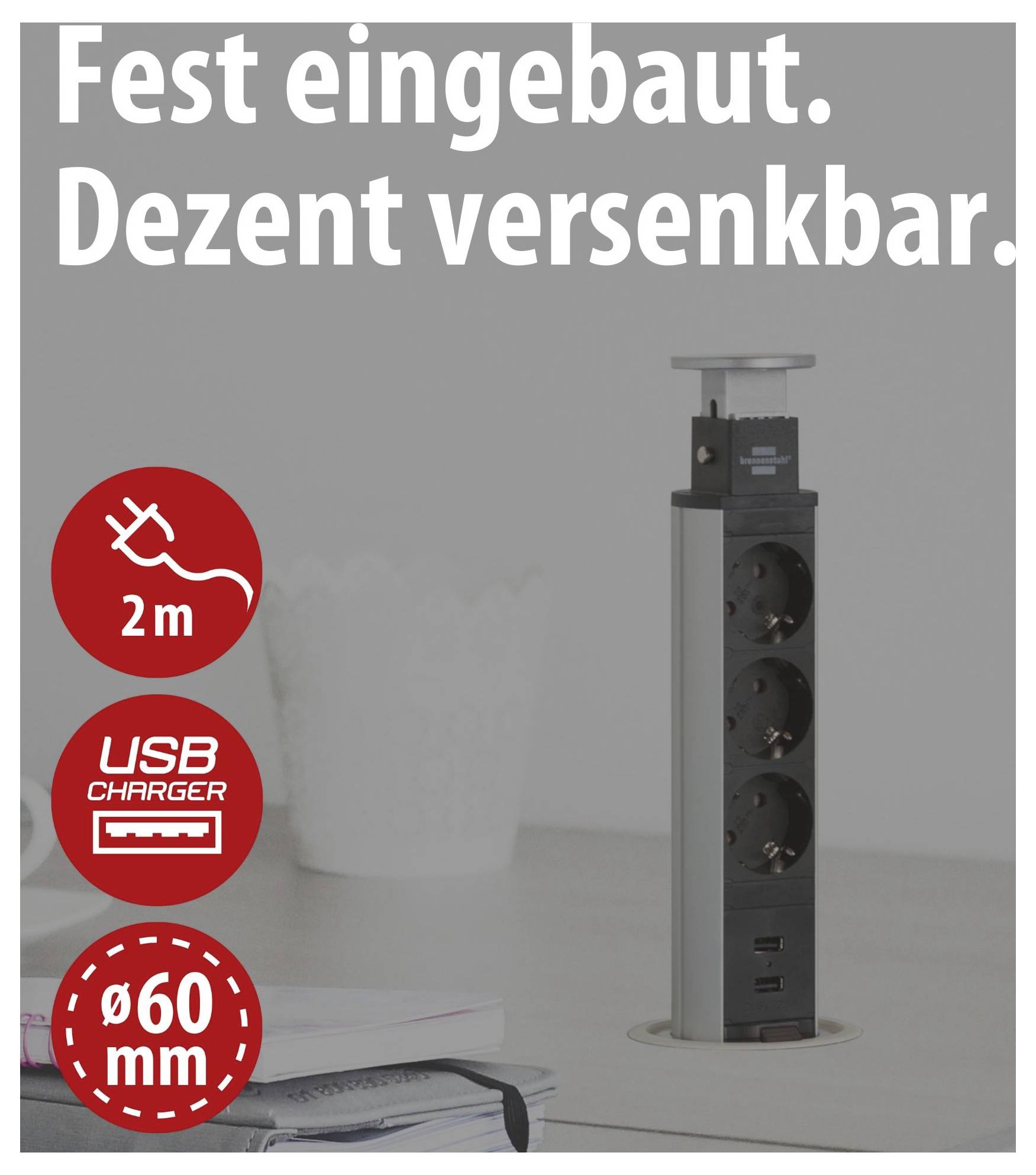Versenkbare Steckdosenleiste mit 3 Steckdosen und USB-Ladegerät, 2 m Kabel, Ø 60 mm Einbau; Text: 'Fest eingebaut. Dezent versenkbar.'
