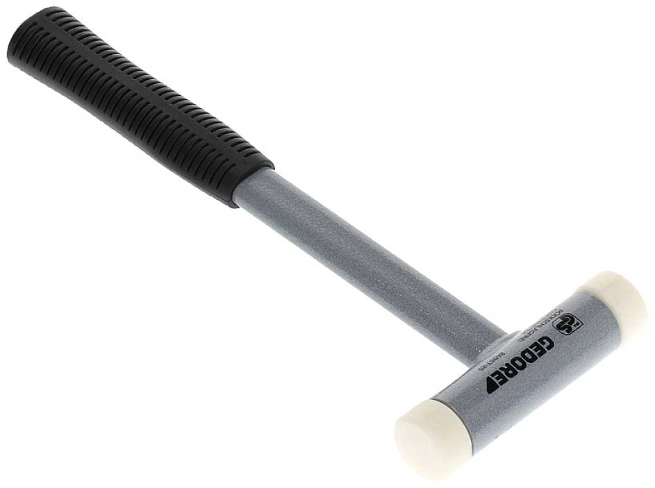 Silberner Hammer mit schwarzem gummierten Griff und weißen Enden, geeignet für spezielle Aufgaben in Werkstätten oder Reparaturen.