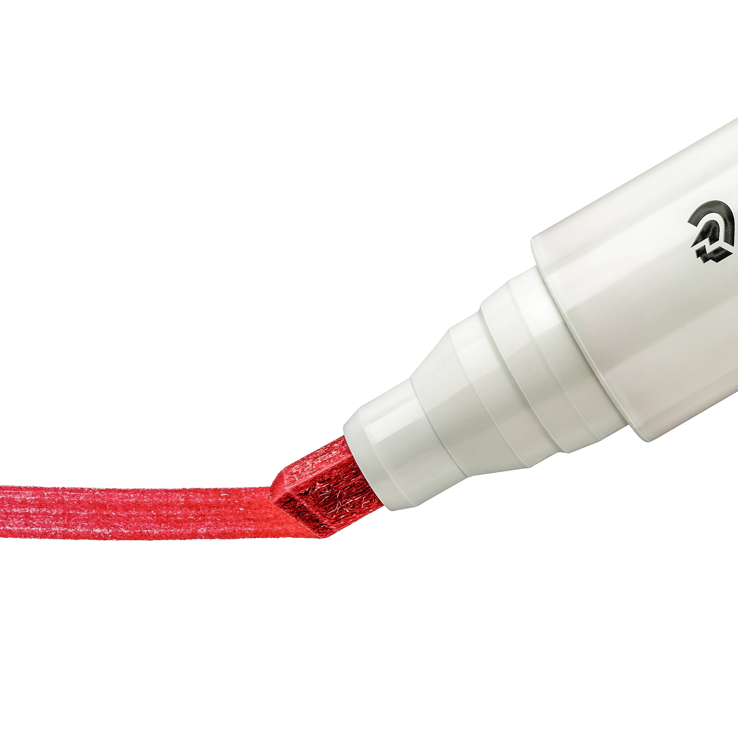 Ein weißer Filzstift mit roter Spitze malt einen roten Strich auf eine weiße Oberfläche.
