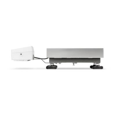 Ein rechteckiges, flaches elektronisches Gerät mit verstellbaren Füßen und einem angeschlossenen weißen Gehäuse auf der linken Seite.