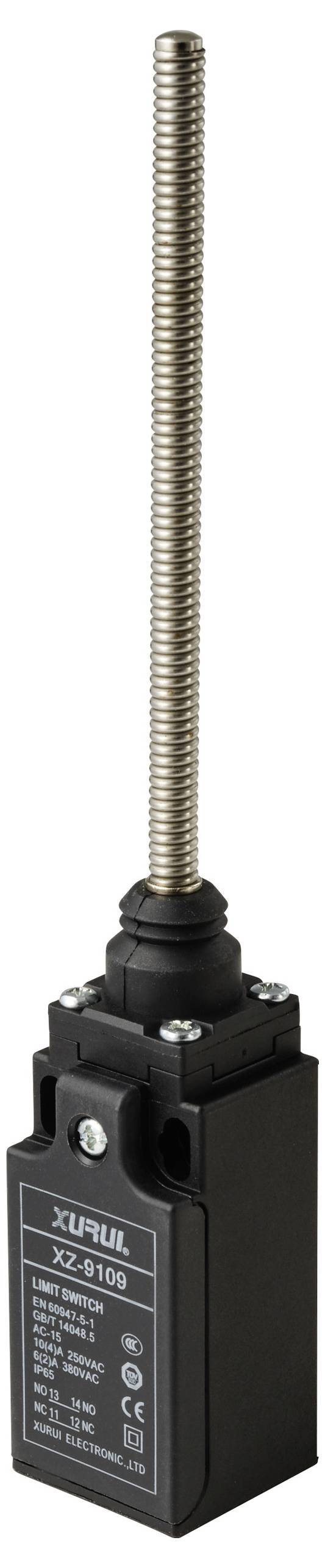 Ein langer Federarm aus Metall, befestigt an einem rechteckigen, schwarzen Schaltergehäuse mit technischen Spezifikationen.