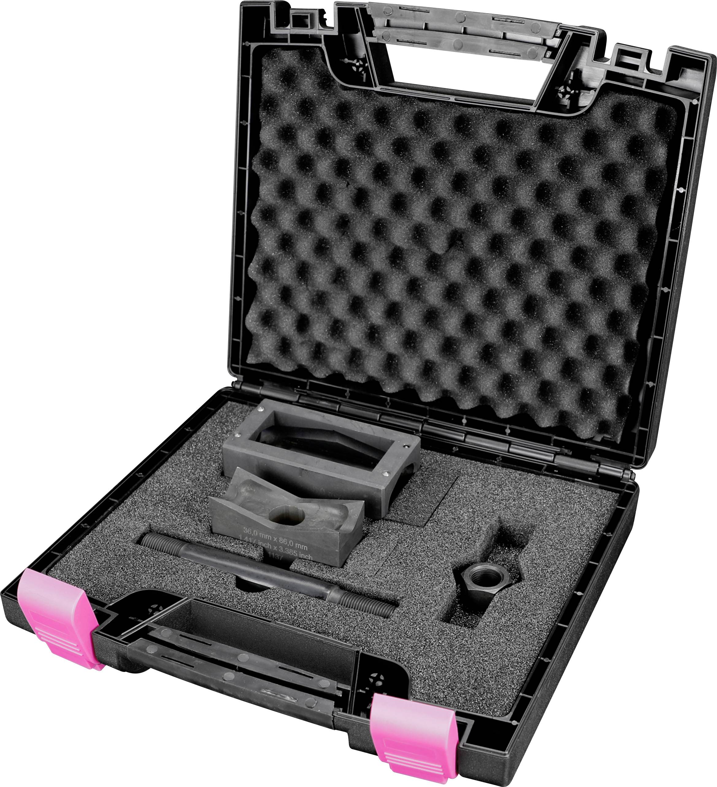 Schwarzer Hartschalenkoffer mit rosa Verschlüssen, der speziell geformte Schaumstoffeinlagen zur sicheren Aufbewahrung von Werkzeugen enthält.