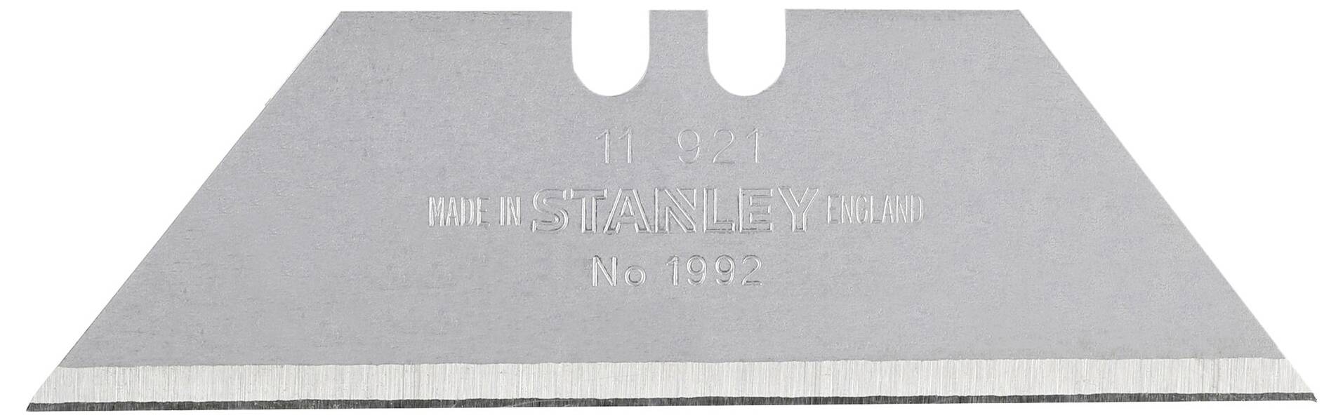 'Einzelne Trapezklinge aus Metall, mit Stanzerprägung "Made in England Stanley No. 1992".'